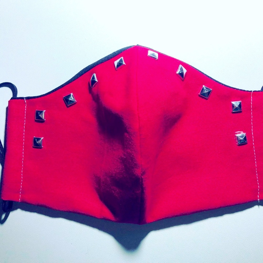 Hot pink mask with pyramid studs